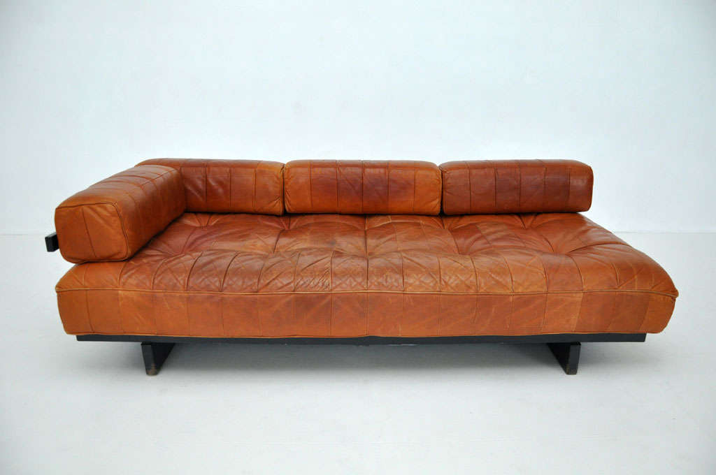 Leather patchwork sofa by De Sede.  Back and arm brackets can be removed/adjusted to fit desired use.  