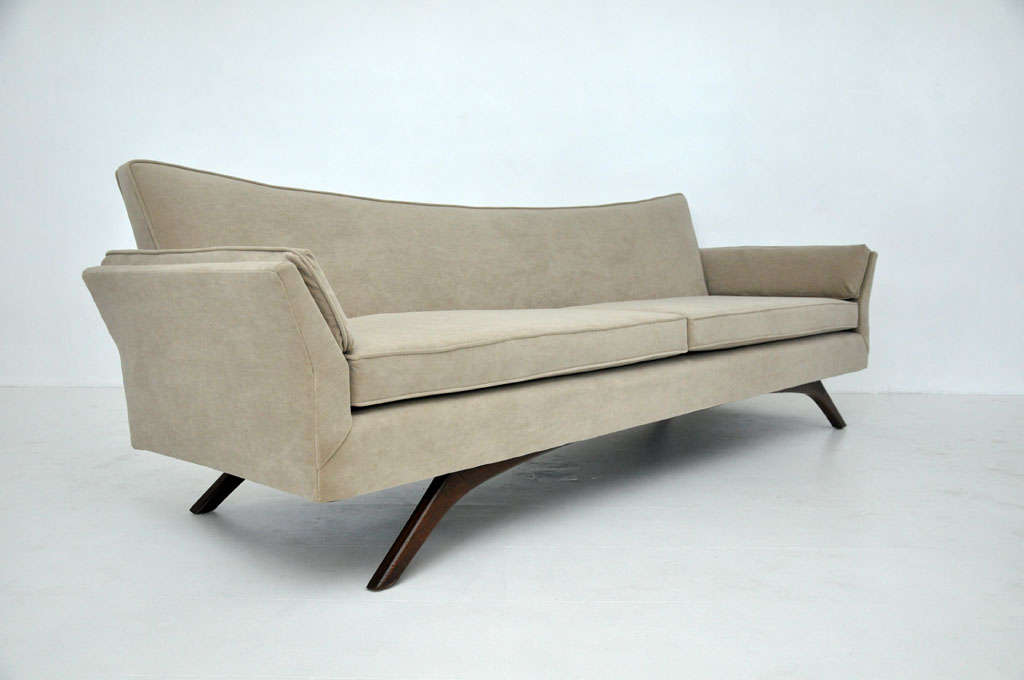 Flare back sofa designed by Adrian Pearsall.  Sculptural form bases.  Newly upholstered.  Dramatic design similar to Vladimir Kagan.