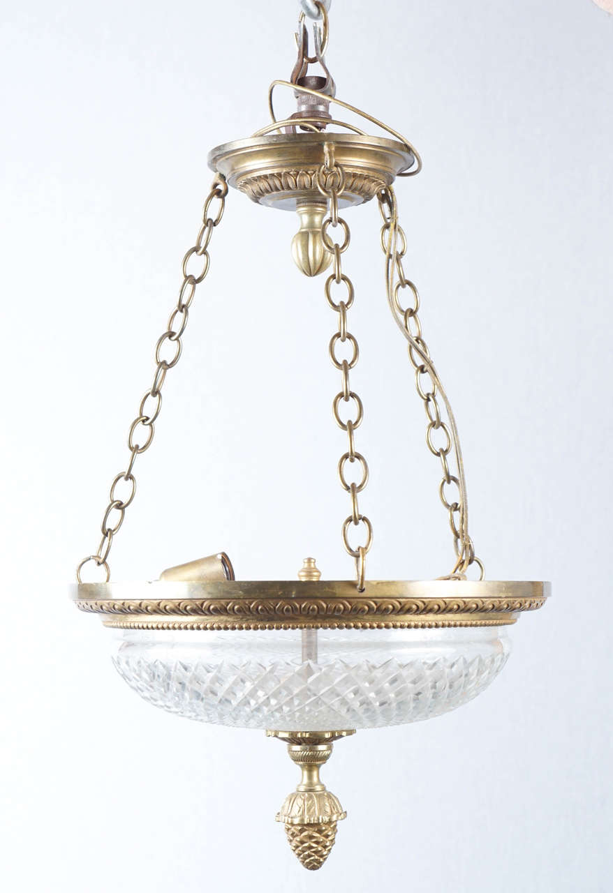 A Bronze and Crystal Pendant Chandelier