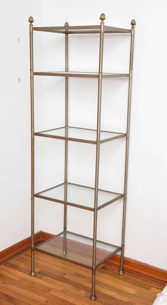 Elegant brushed steel and brass etagere attributed to Maison Jansen.