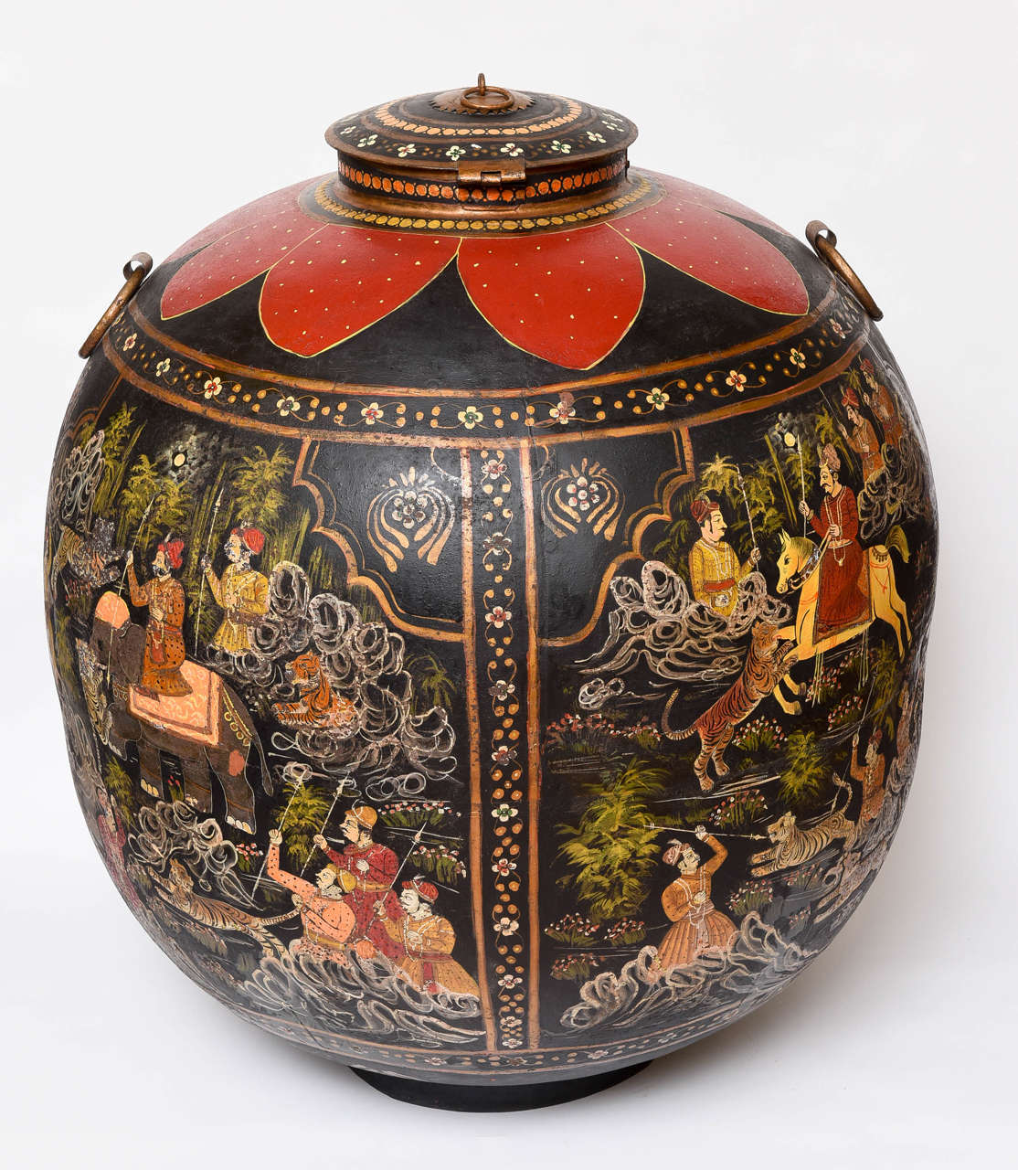 The piece is fashioned with royal figures atop elephants and horses, as well as tiger hunting scenes.
An outstanding 19th century decorative accent.