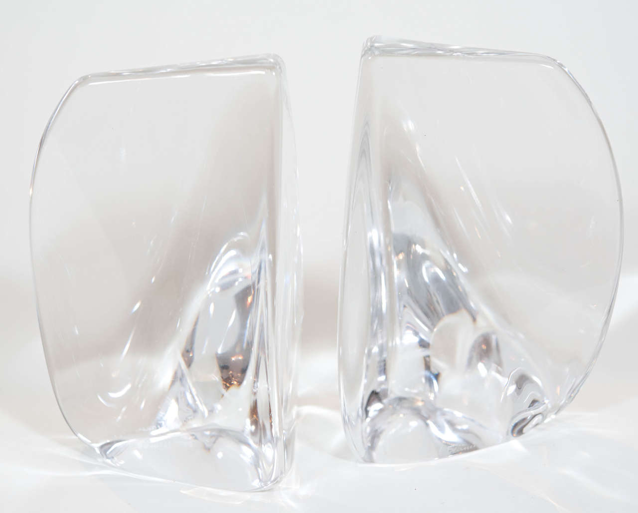 A lovely par of signed Daum glass sculptural-organic shaped bookends from France!