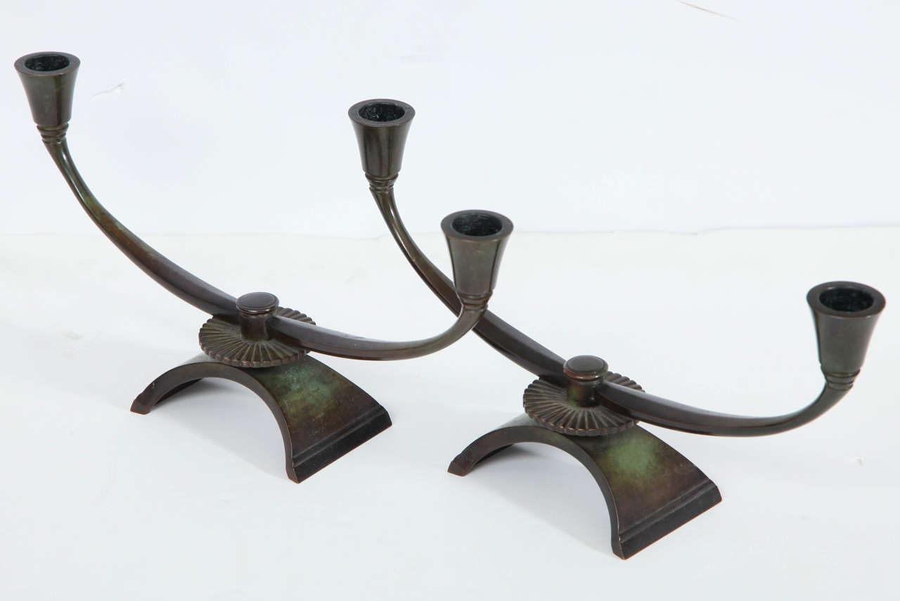 An elegant pair of Just Andersen patinated bronze candleholders, Circa 1930s, 
Stamped on base.