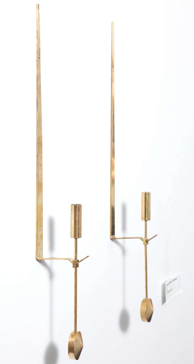 A set of four polished brass wall mounted candleholders designed by Pierre Forssell and produced by the Skultuna foundry, Sweden.

Stamped and inscribed on the verso.

The famous silver-smith and designer Pierre Forssell worked at Skultuna Brass