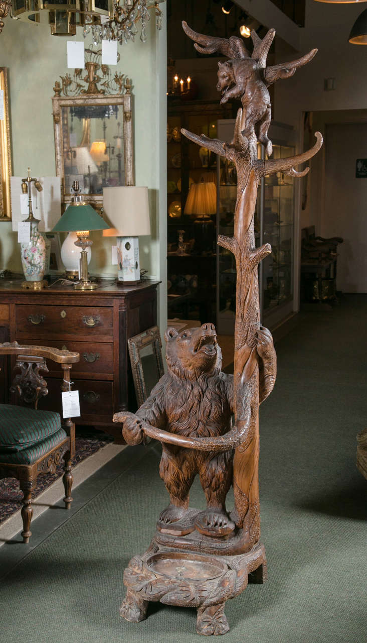 A beautiful carved bear Black Forest coat rack or umbrella stand.
