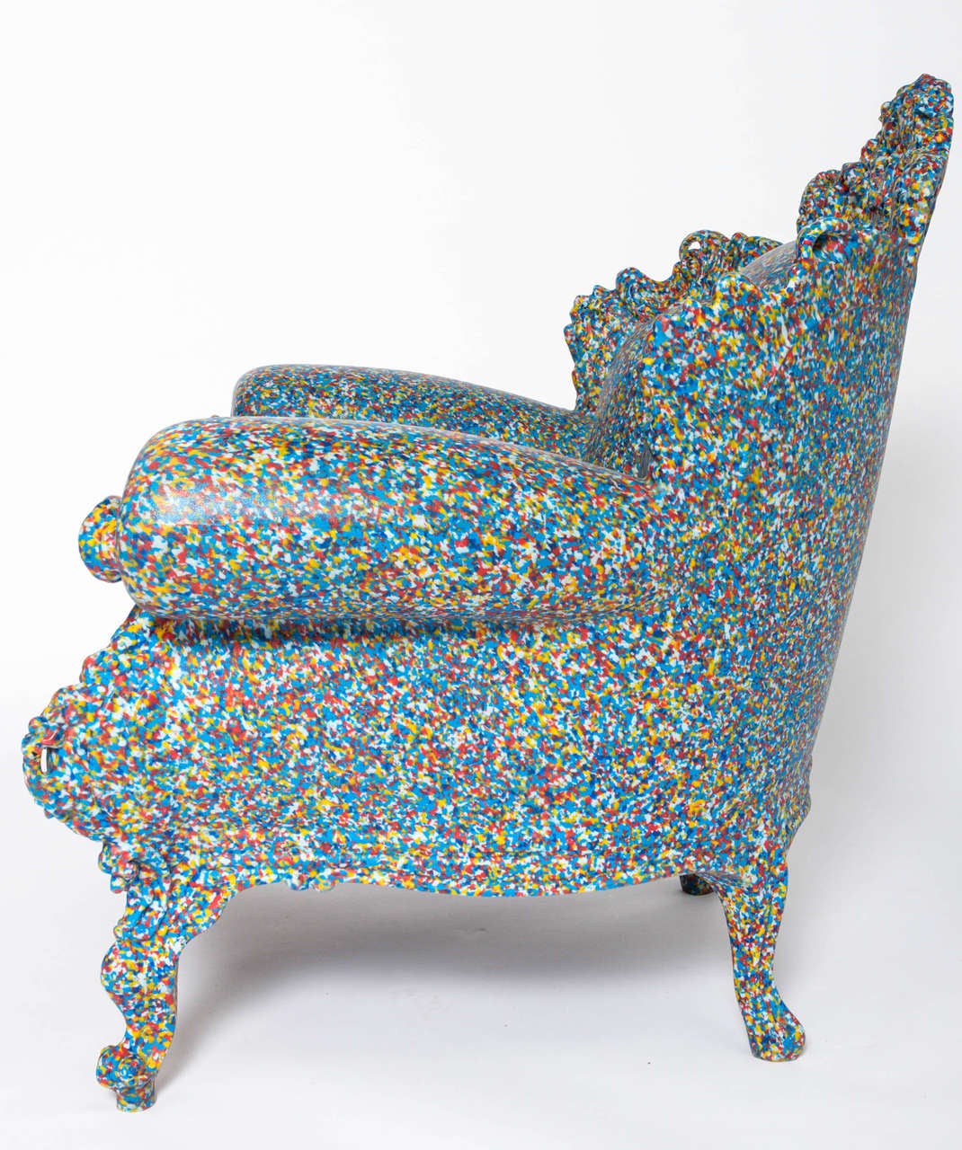 An armchair, the proust, by Alessandro Mendini.
Multi coloured resin base.
Originally designed in 1978 for Studio Alchimia, Milan.
Produced by Magis.
Italy, 2011
Measures: 105 cms x 104 cms x 90 cms.

The “Proust” chair is the most famous