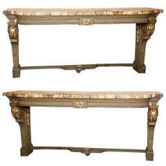 A pair of Monumental Maison Jansen France Marble Top Consoles