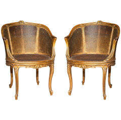 Pair of Caned Bergere Chairs by Jansen Pair of Caned Bergere Chairs by Jansen