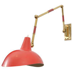 Adjustable wall sconce by Stilnovo with brass and leather arm