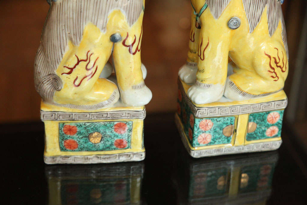 A Pair of Chinese Polychrome Decorated Seated Foo Dogs, 20th c. 4