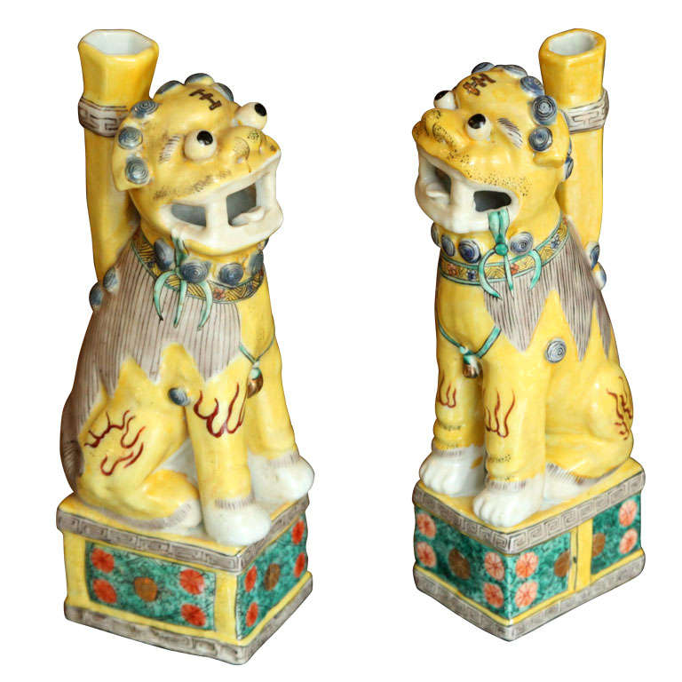 A Pair of Chinese Polychrome Decorated Seated Foo Dogs, 20th c.