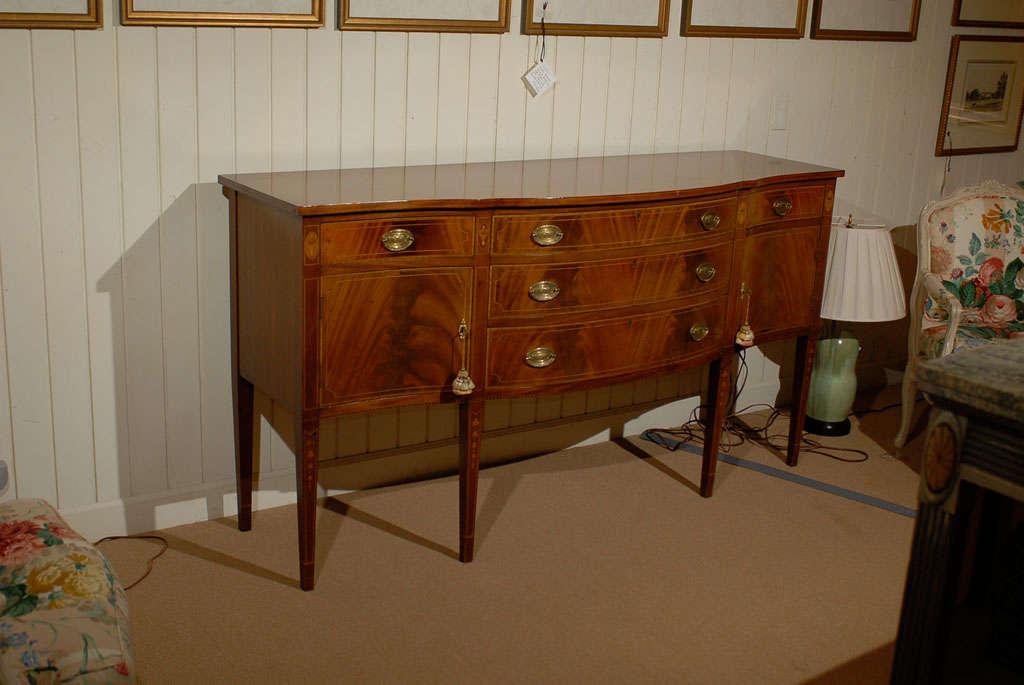Mid 19th c. American Federal style Bow front faded Mahogany Sideboard.   Beautiful patina.