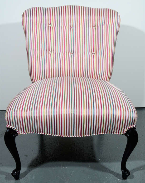 Louis XV style slipper chair newly upholstered in a modern <br />
striped silk blend fabric with mutiple colors evocative of<br />
designer Paul Smith's color palette. The chair has a sinuous<br />
back design as well as button back details.  The