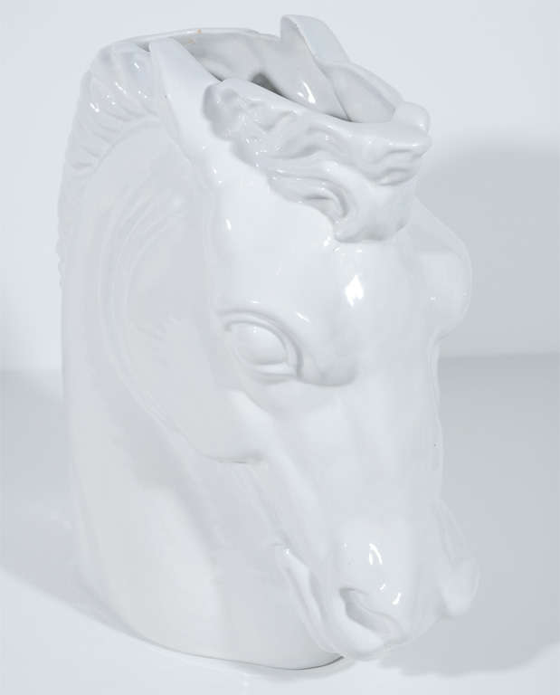 Vintage handcrafted horse head sculpture with white glaze finish.  Also functions as decorative vase or centerpiece, with stunning profile and detail. Has illegible signature and marking on the underside.