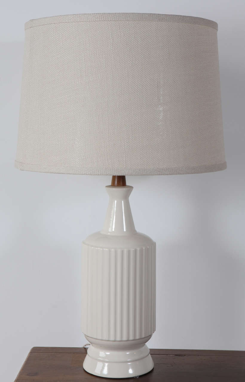 White column ceramic table lamp with teak column socket. Shade sold separately (approx. $100). Measurement to top of harp is 30