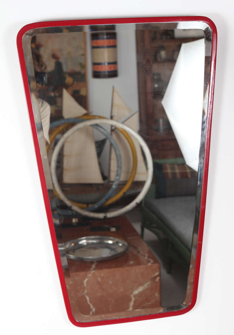 Vintage French wall mirror with red powder coated enamel frame.