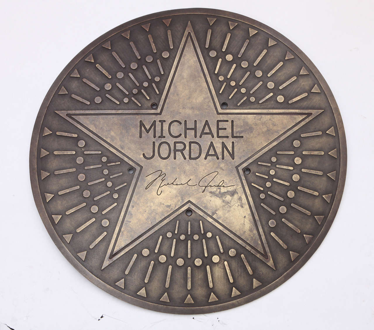 A 1980s Michael Jordan bronze architectural plaque.