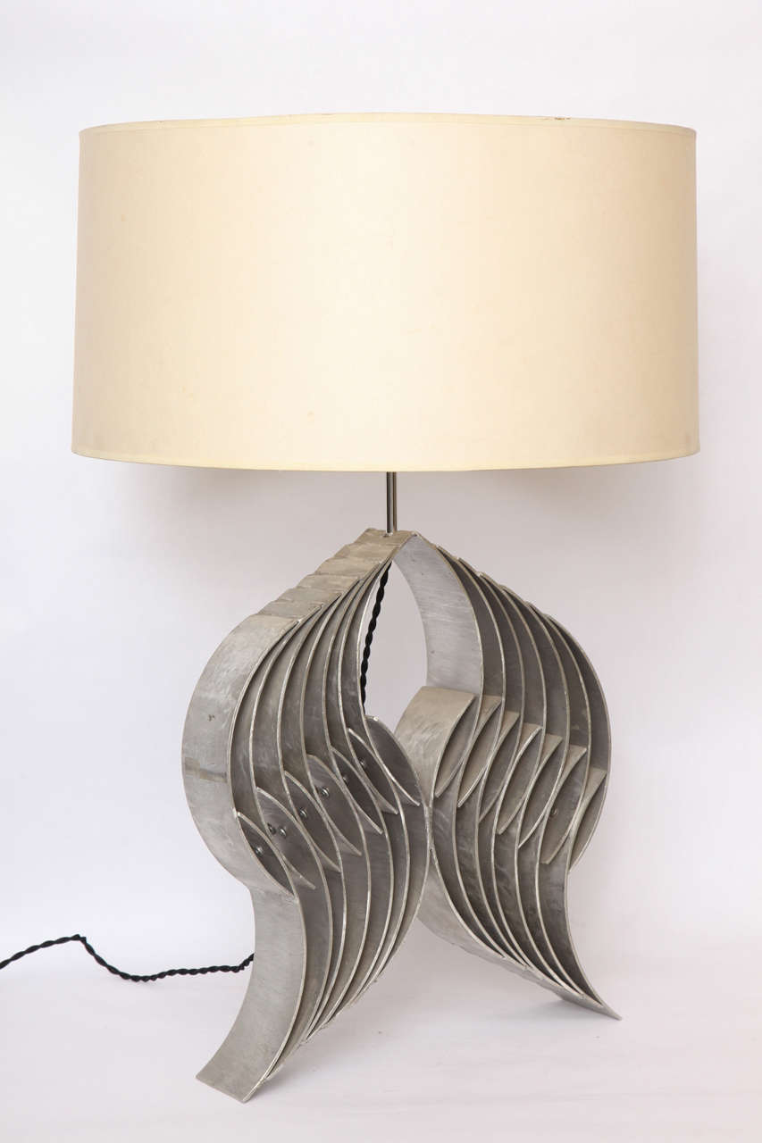 A 1960s sculptural table lamp handcrafted of aluminum.
Shade not included