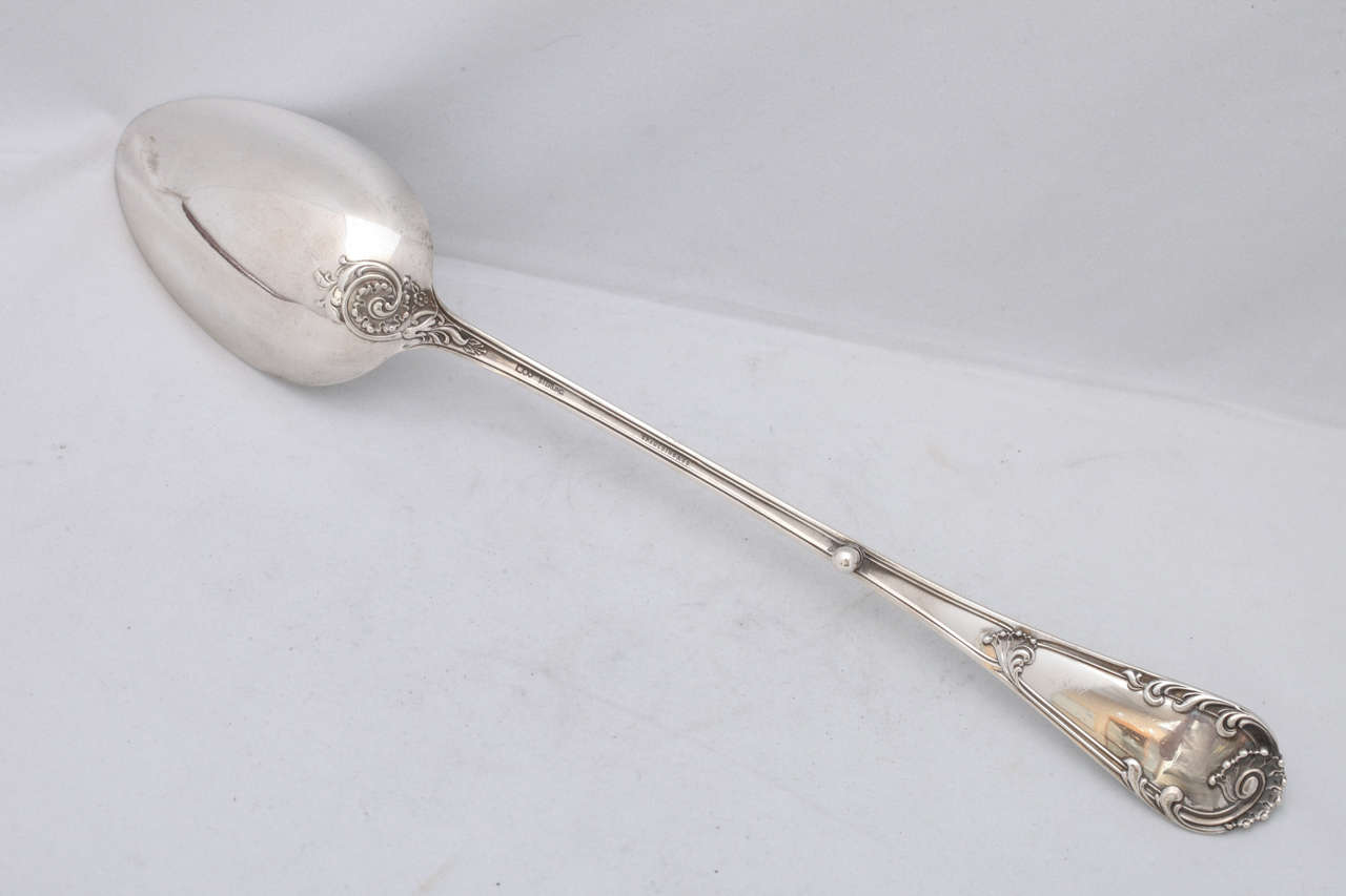 Large, American Victorian period sterling silver stuffing/serving spoon, Dominick & Haff, New York, circa 1888, Louis XIX style. Measures: 13