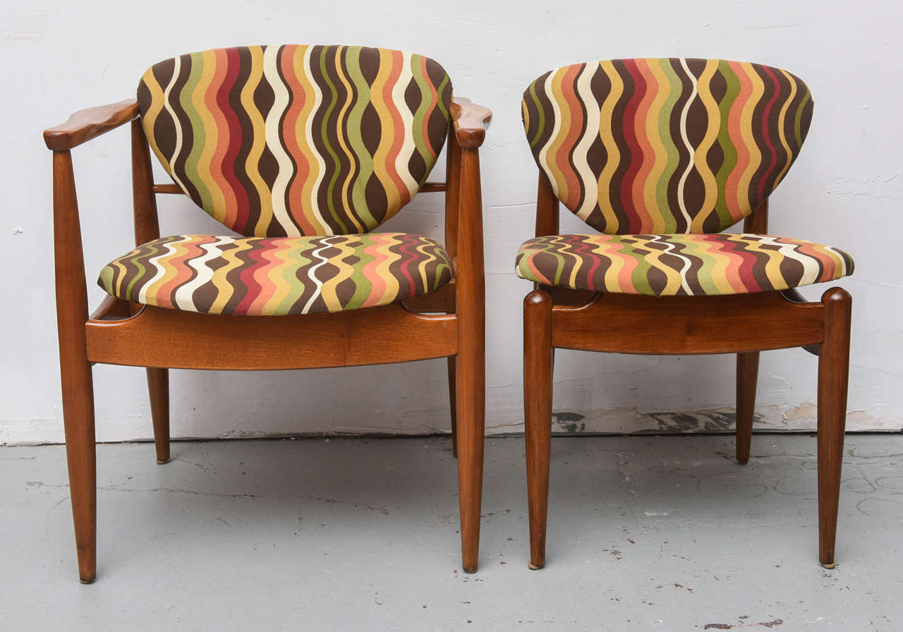 Set of six chairs, two with arms, four without.  Can be sold as a set of four without arms or a pair with arms, but this listing is for all six.  Upholstery needs to be redone.