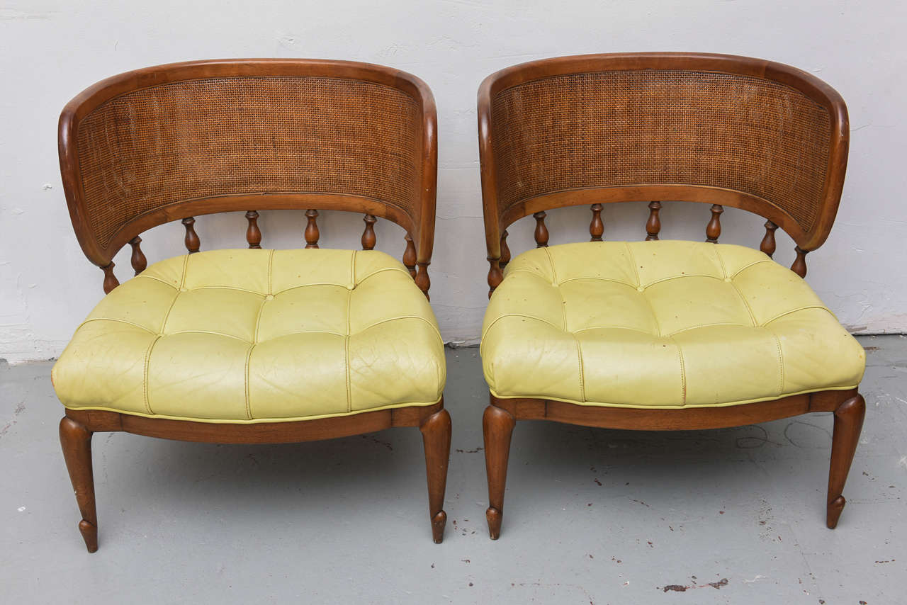 Great pair of sturdy MCM barrel back caned lounge chairs. Upholstery should be redone, but wood is in great shape as is caning, USA, 1950s.