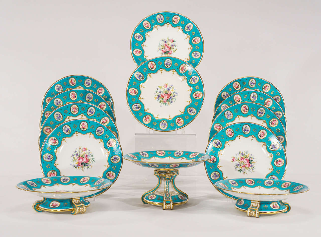 A lovely hand painted dessert made by Minton ca. 1920's this service consists of 10 dessert plates measuring 9 1/8