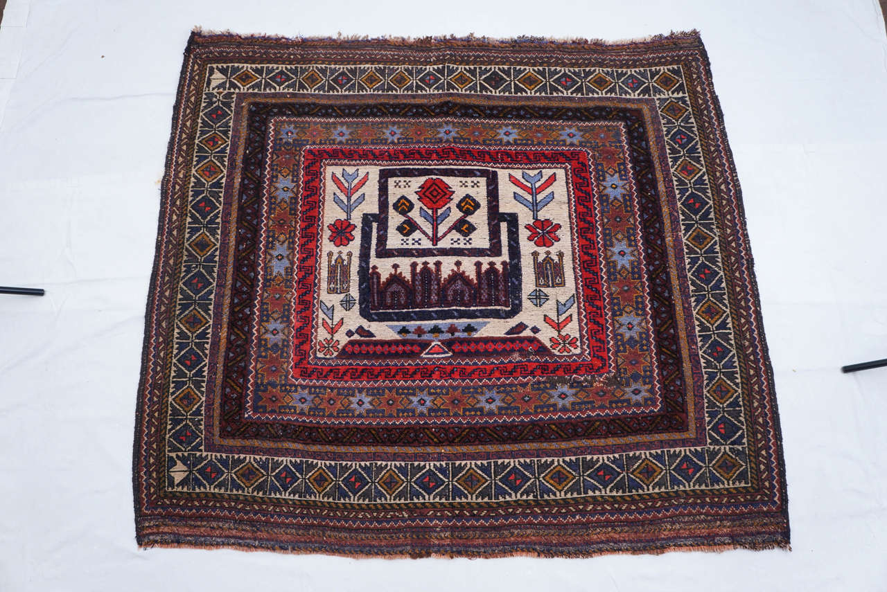 hand made beautiful little throw rug.
i know nothing about this rug or carpet except that it is a great design, wonderful colors, and a great small size that fits anywhere.
condition is very good in my opinion.