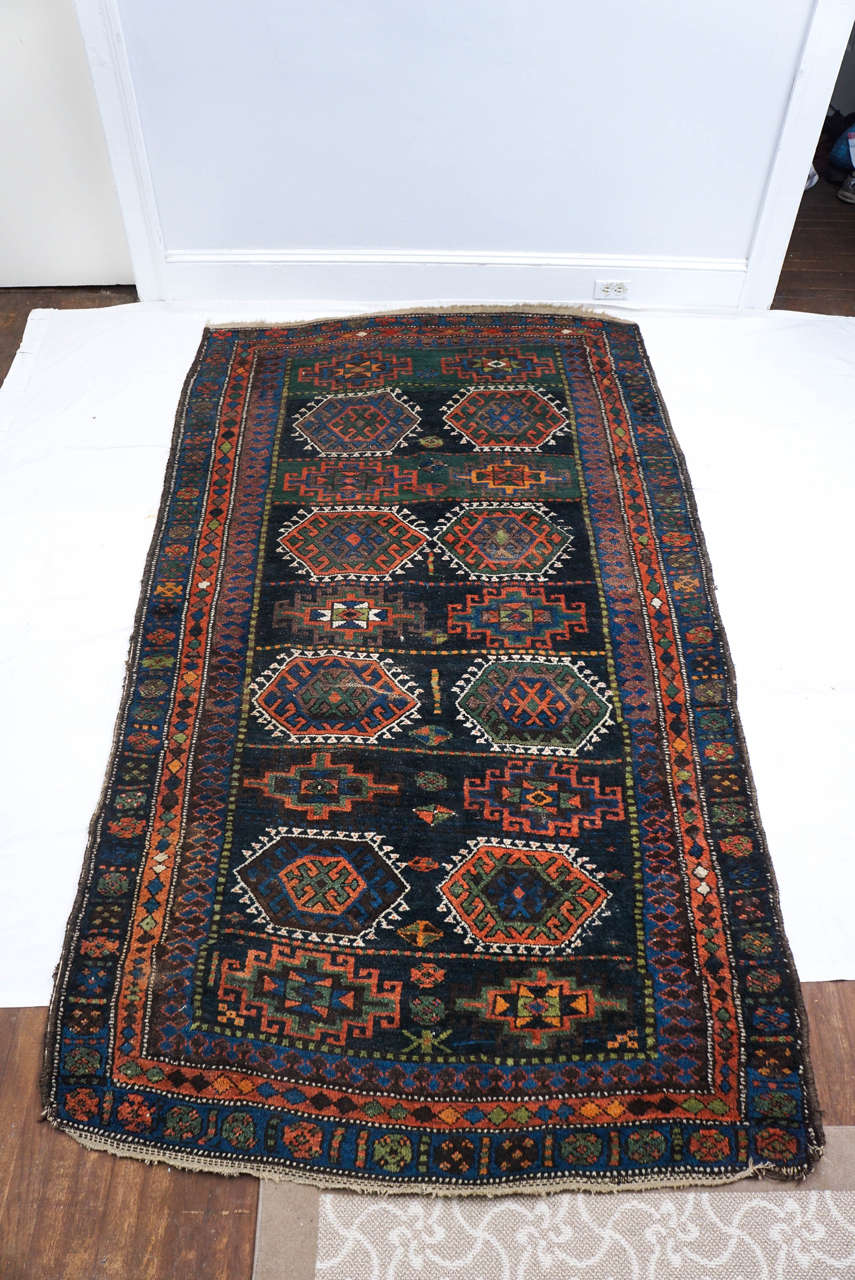 beautiful vintage wool Turkish carpet in very nice condition.
the colors are really great. there is plenty of life in this carpet with a nice amount of pile still there. a couple of the corners show age, but does not detract in any way. Love the