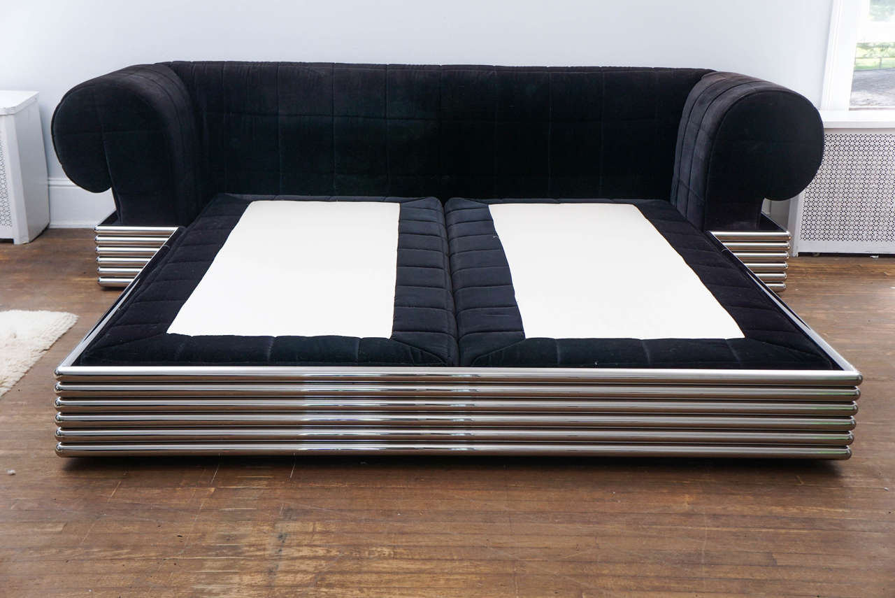 It's huge.
This bed was made by Brueton in the early 1980s.
I was told it was a custom order and the only one made in this style.
It is large and needs a good size room. Perfect for someone who prefers to really stretch out in bed!
Light wear to