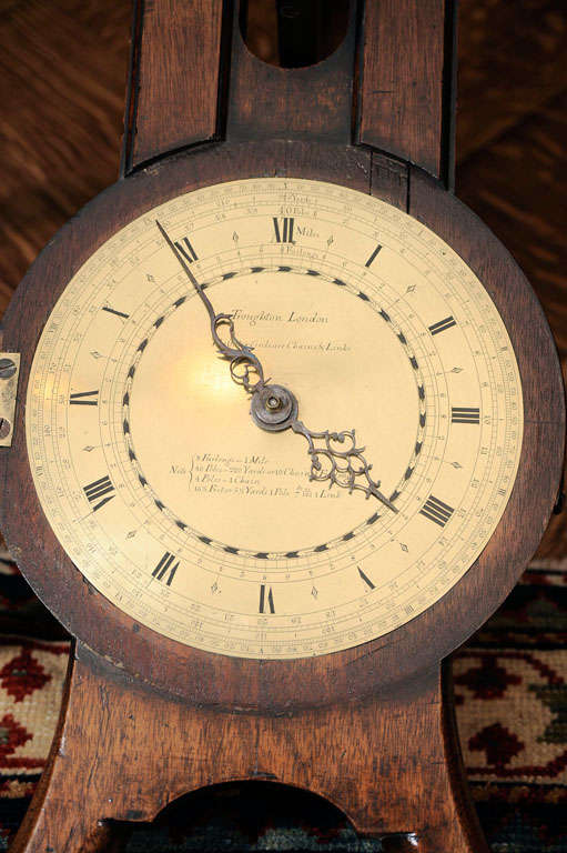 Wood A Mahogany and Brass Waywiser, the dial signed Troughton, London