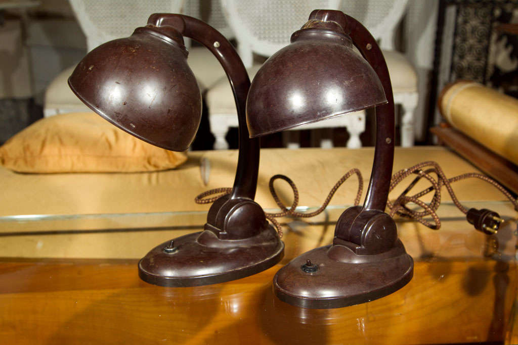 Seen in the Amazon Original Series, "The Collection", this pair of adjustable reading lamps is made from bakelite and embodies the best of Bauhaus style. In excellent condition for their age, they will need re-wiring for the U.S, which we