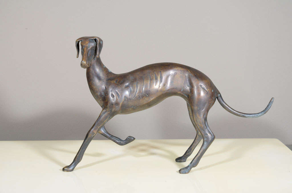 A stunning bronze statue of a greyhound.  USA, circa 1940.<br />
<br />
Item may be viewed at our showroom at Center 44, 222 East 44th Street, Second Floor, New York, NY 10017. For phone orders, call 917-669-4540. For showroom, call 212-450-7988.