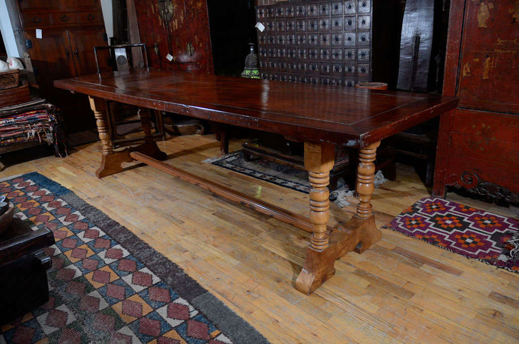 Framed plantation table with rosewood top and ironwood legs