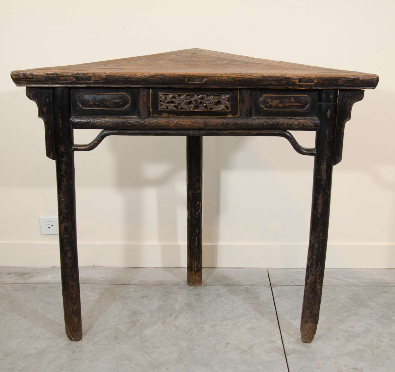 An unusual Chinese corner table, circa 1850, from Shanxi Province. With beautifully carved drawer and fine patina.

Dimensions: 
Front - left to right : 39