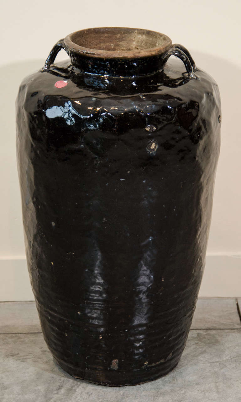 A tall, classically proportioned, black ceramic jar from Shanxi Province, c.1900.
CR452
abhayatribeca.com