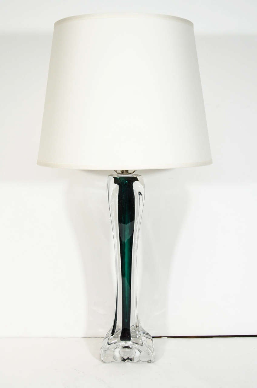 A graceful and elegant pair of crystal lamps produced by Flygsfors, Sweden, in a stunning emerald green. 