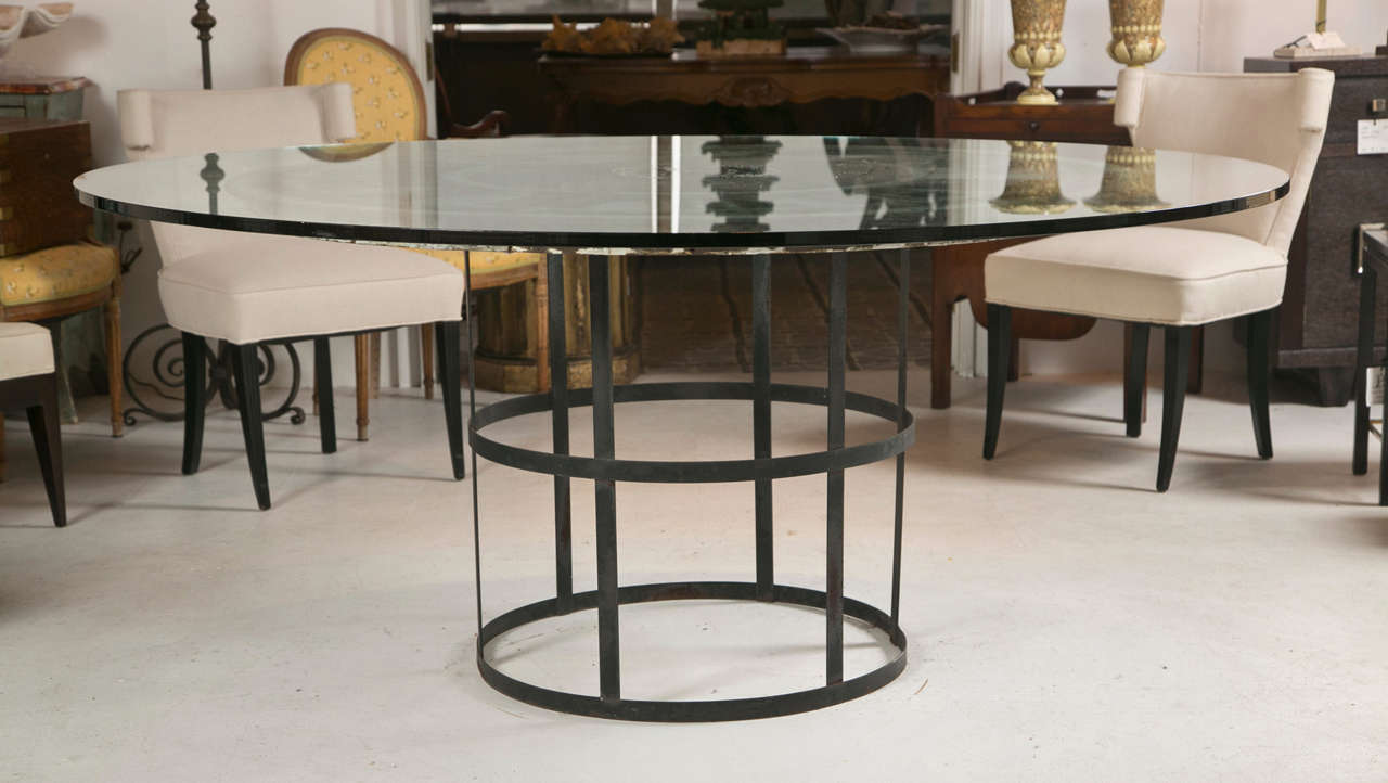 A Fabulous dining room table that is sure to make a statement. Made from a 19th century clock.