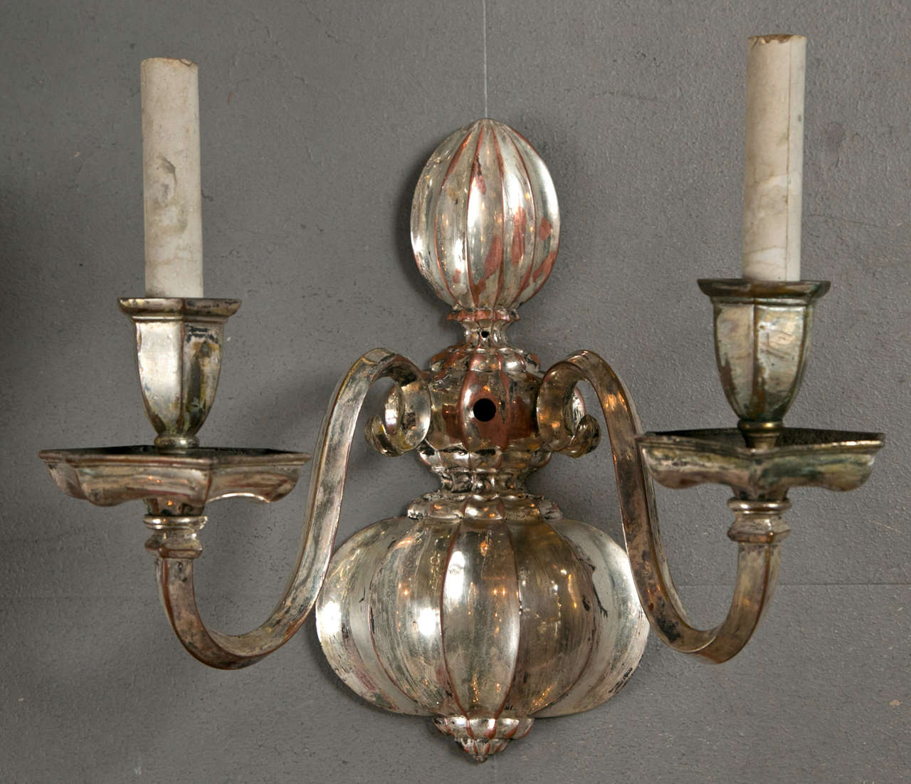 A fabulous set of eight silver plated Caldwell sconces, circa 1920s. Priced per pair.