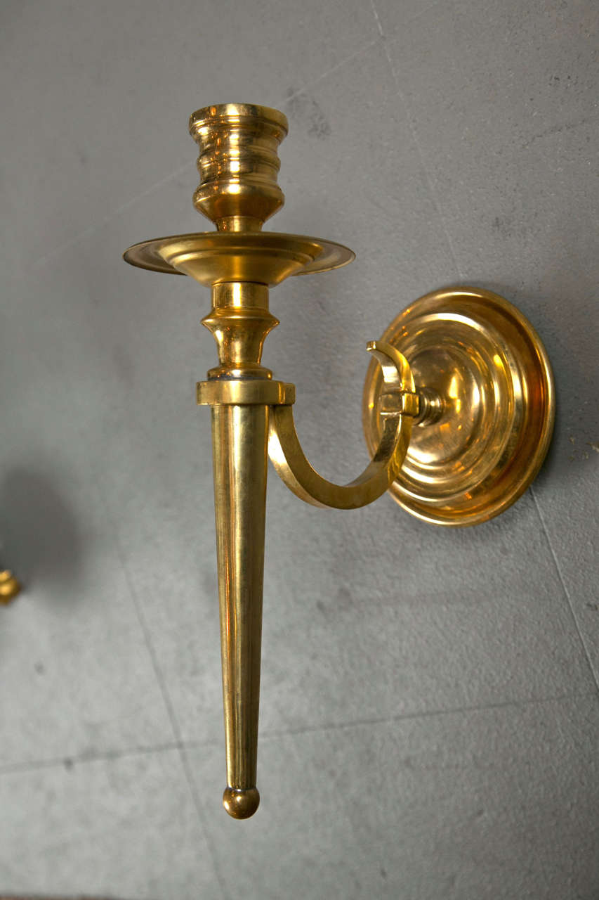 A wonderful set of eight gilt bronze Caldwell sconces. Sold and priced per pair.