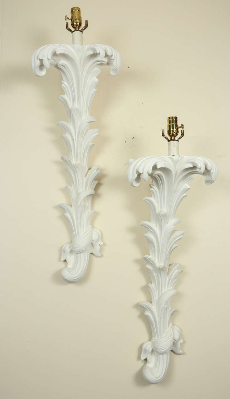 Large pair of plaster leaf sconces in the style of Serge Roche.