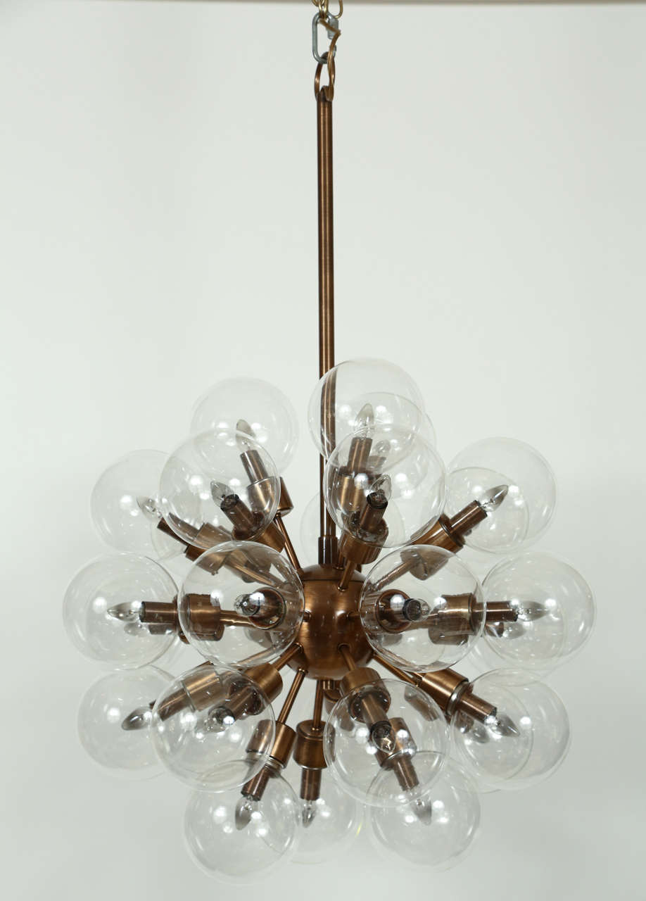Vintage Rare custom bronze Sputnik chandelier by Lightolier.  There are 29 light sources with clear 6