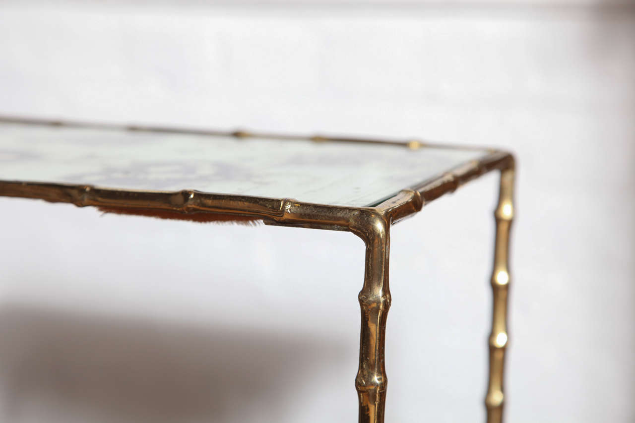 A Gilt Brass and Antiqued Mirror Faux Bamboo Etagere Table. France c. 1950 3