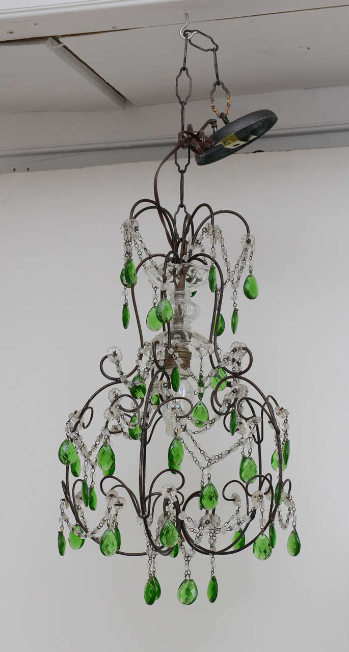 Metal frame with swags of clear glass beads and larger green and clear drops. Single light,new wiring