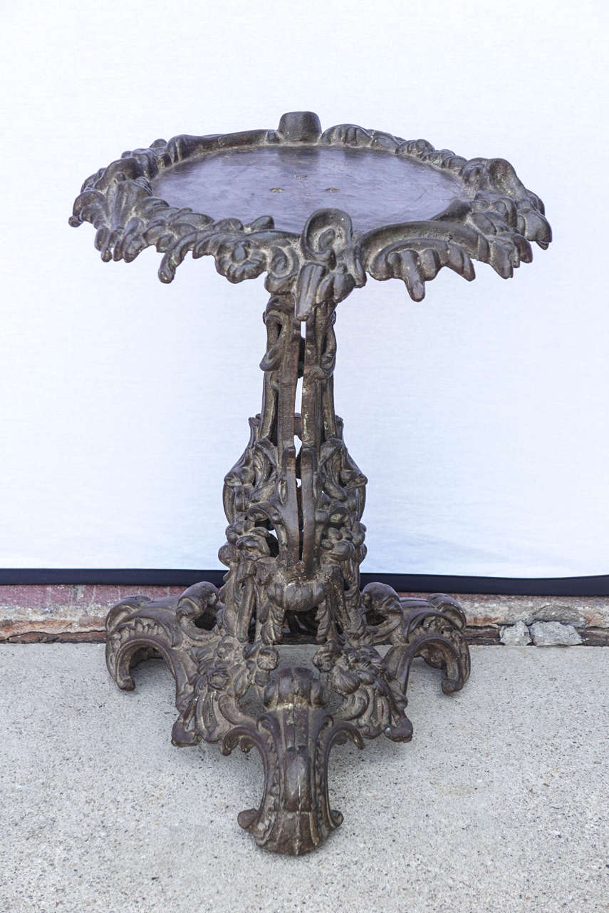 An amazing piece of quality art and sculptural iron table, suitable for indoor or outdoor.