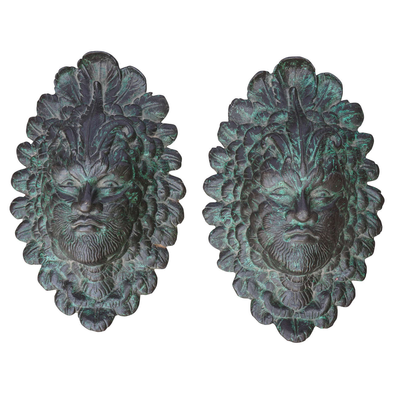 Early 20th Century Pair of Ornate Iron Masks For Sale