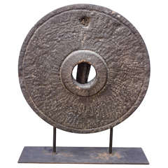19th Century Millstone on a stand