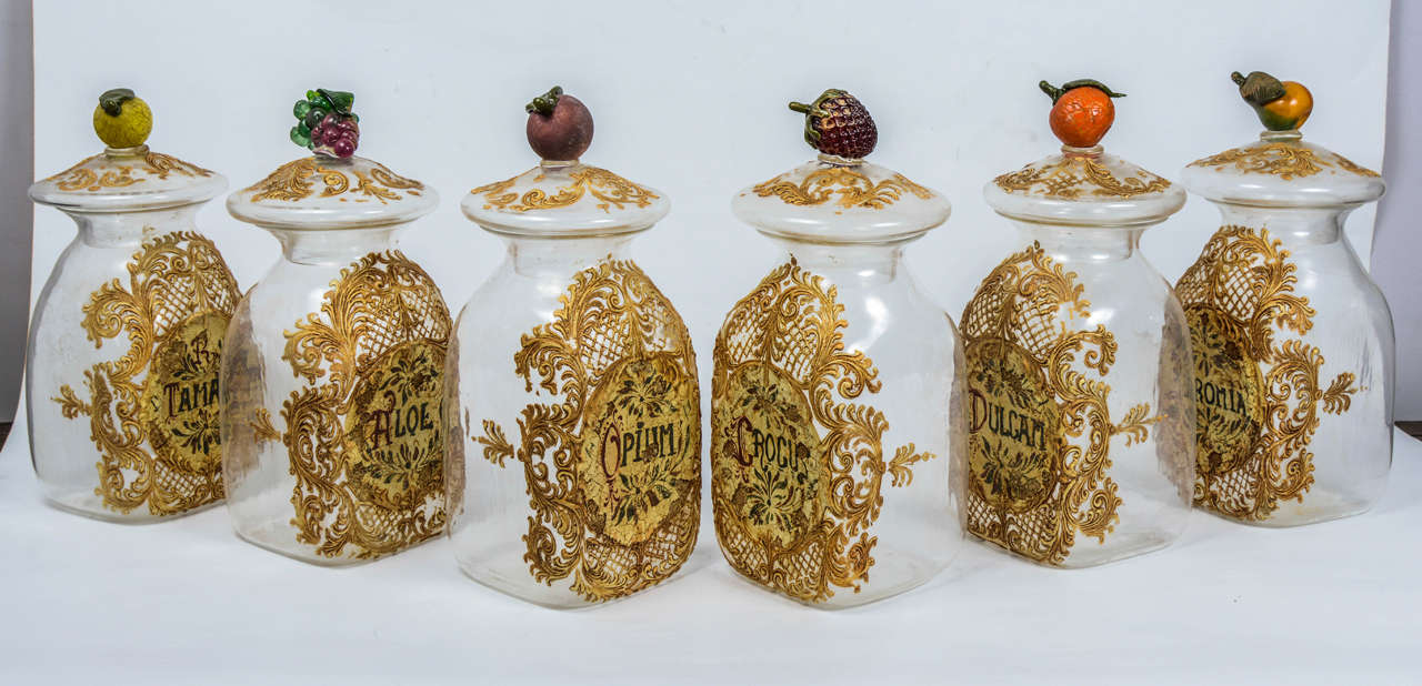 Set of six apothecary jars in glass.