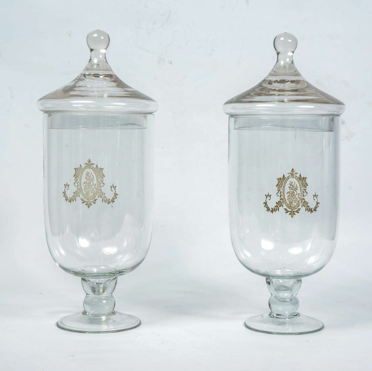 Pair of ornamental pots in glass.