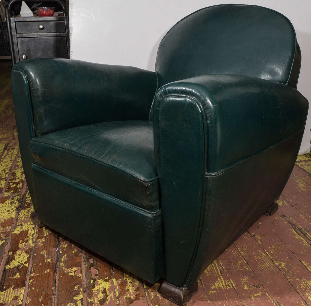 Classic green leather French club chairs from the 1940s.