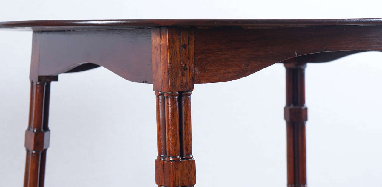 Early 19th Century Oval Topped Regency Mahogany Side Table on Casters For Sale